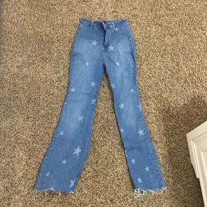 Blue flare jeans with stars from Nasty Gal, size 6